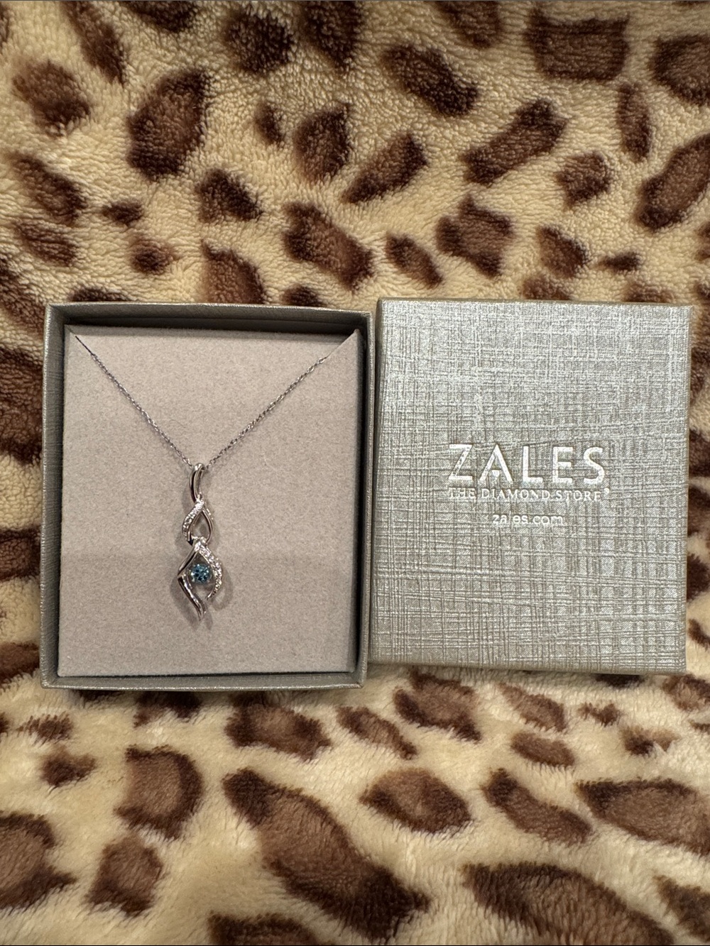 Zales Silver Blue Topaz Twist Pendant Necklace with Chain
